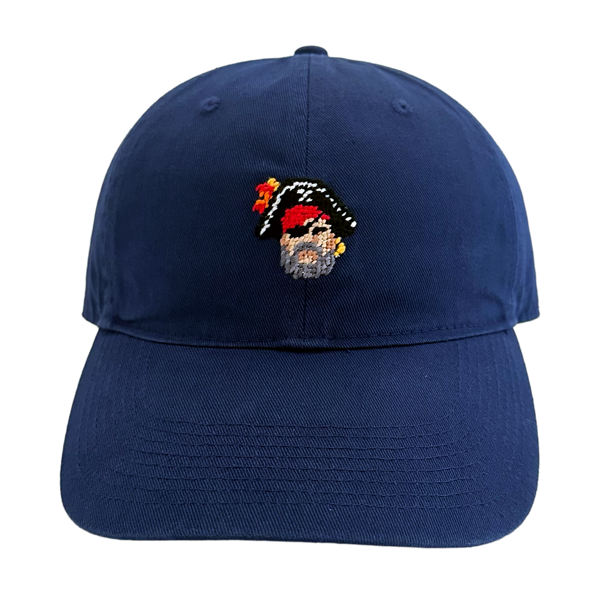 Front view of Smathers & Branson Pirate Needlepoint Hat exclusive to Salt Pines featuring hand-stitched skull and crossbones embroidery.
