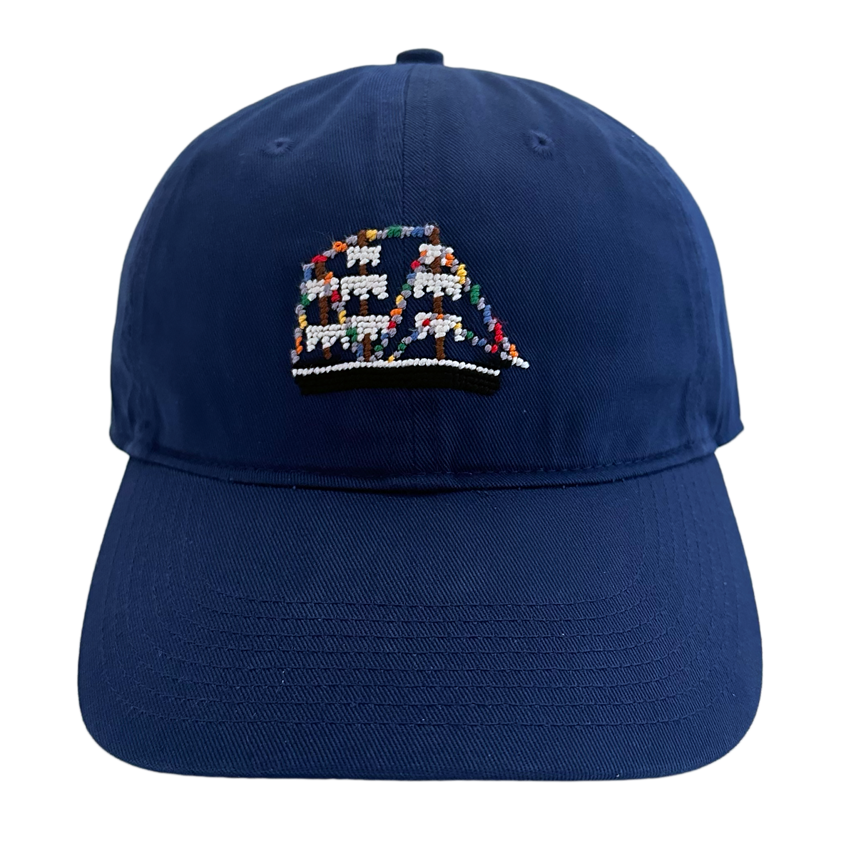Front view of the Smathers & Branson Jose Gasparilla Needlepoint Hat, exclusive to Salt Pines, featuring hand-stitched pirate ship embroidery.