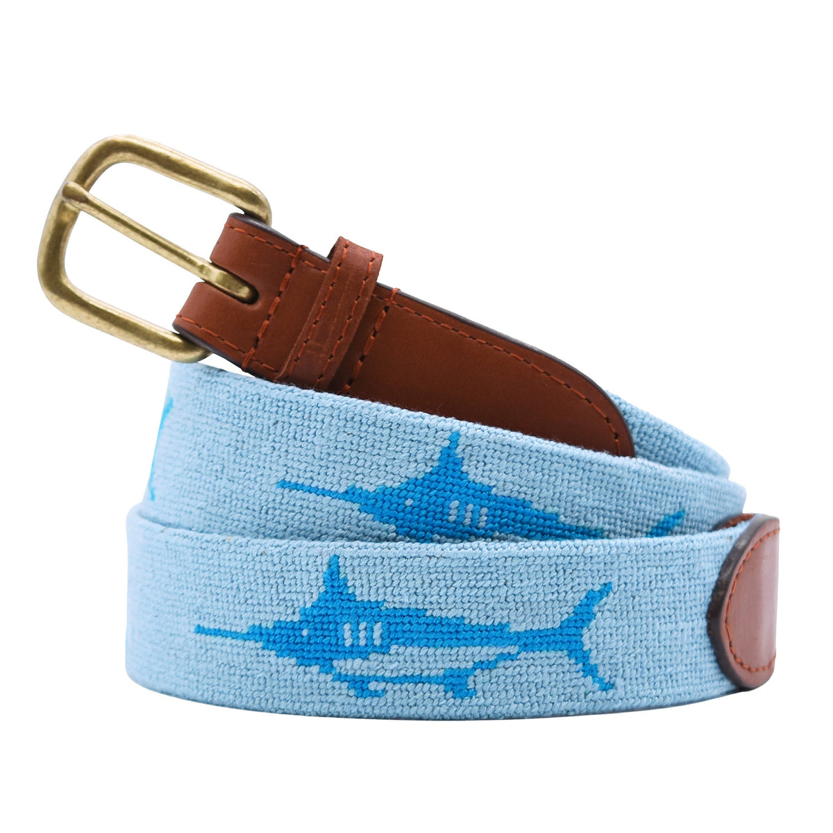 Smathers and Branson sky blue needlepoint belt with marlin pattern and brown leather strap on a white background